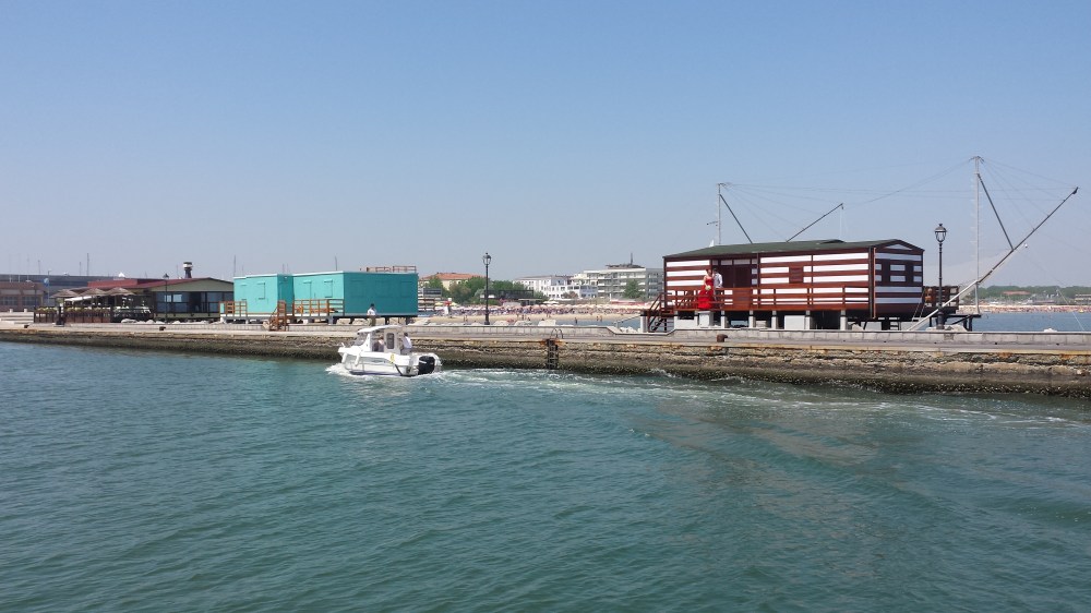 ... little white boats were passing by them..