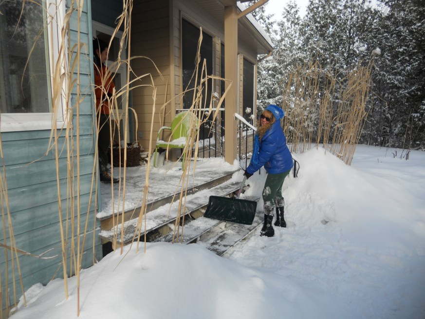 shoveling snow in winter houses