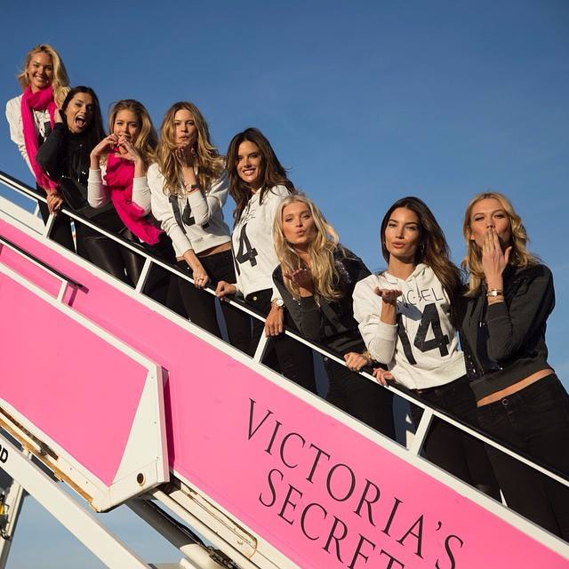 victoria secret models boarding plane flight NY London